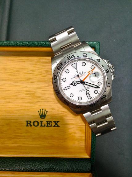 The Oystersteel copy Rolex Explorer II 216570 watches have white dials.